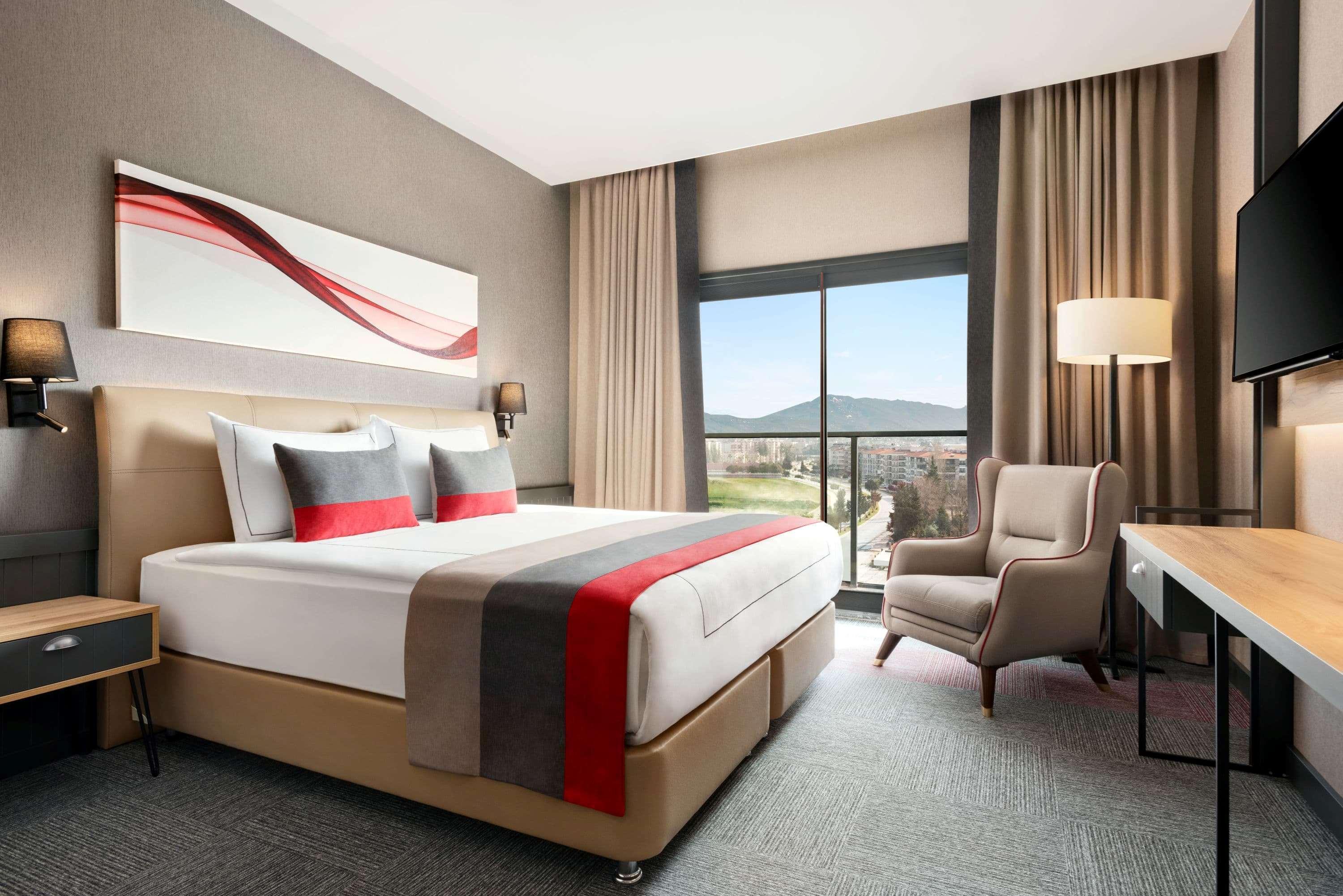 Hotel Ramada By Wyndham Tire Extérieur photo