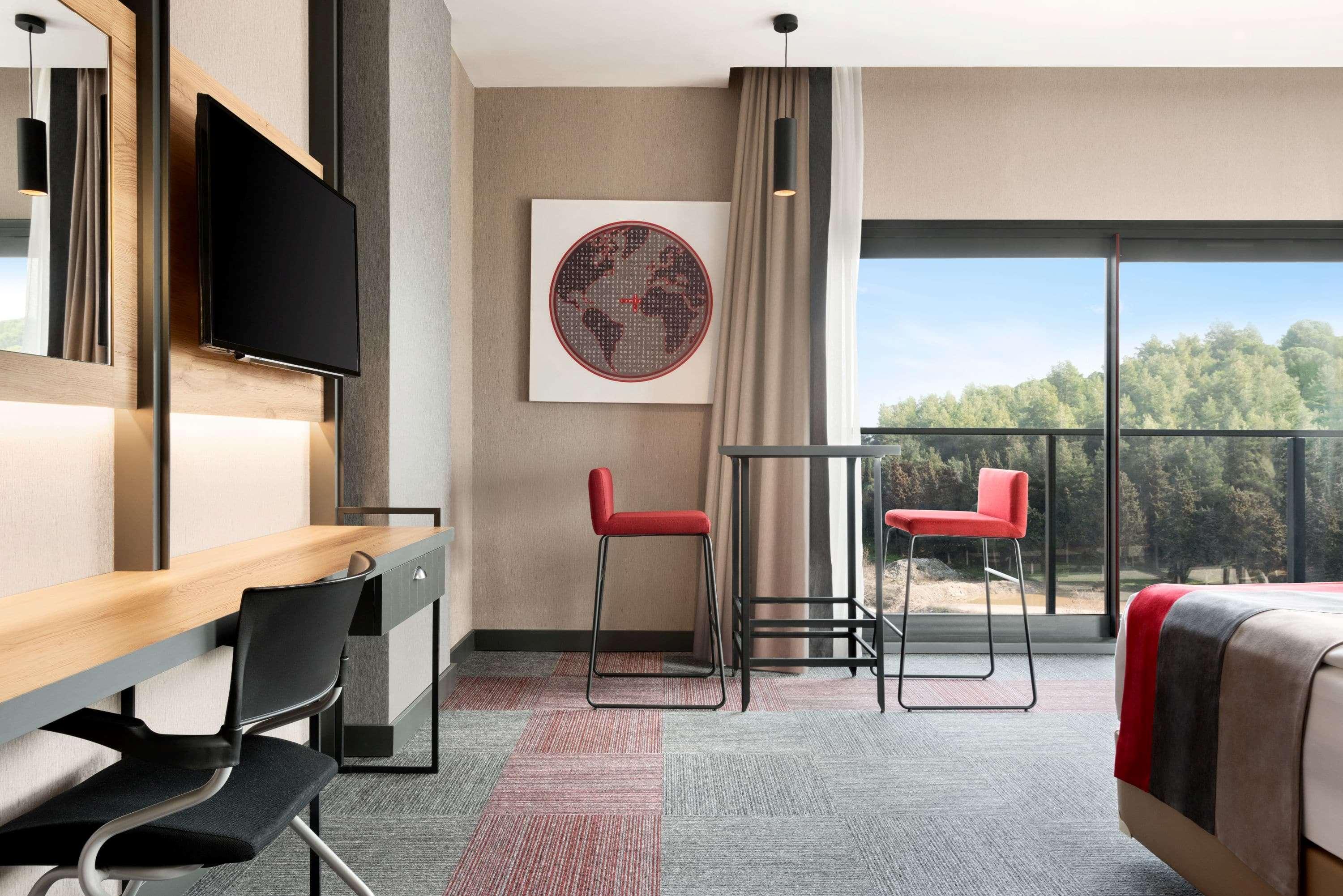 Hotel Ramada By Wyndham Tire Extérieur photo