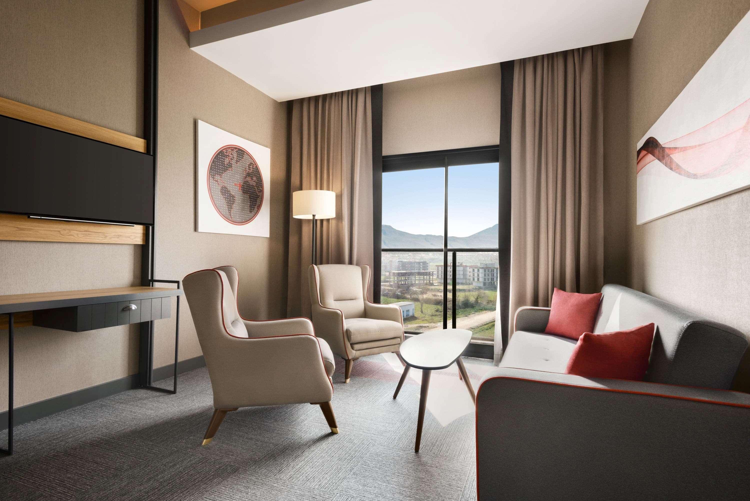 Hotel Ramada By Wyndham Tire Extérieur photo
