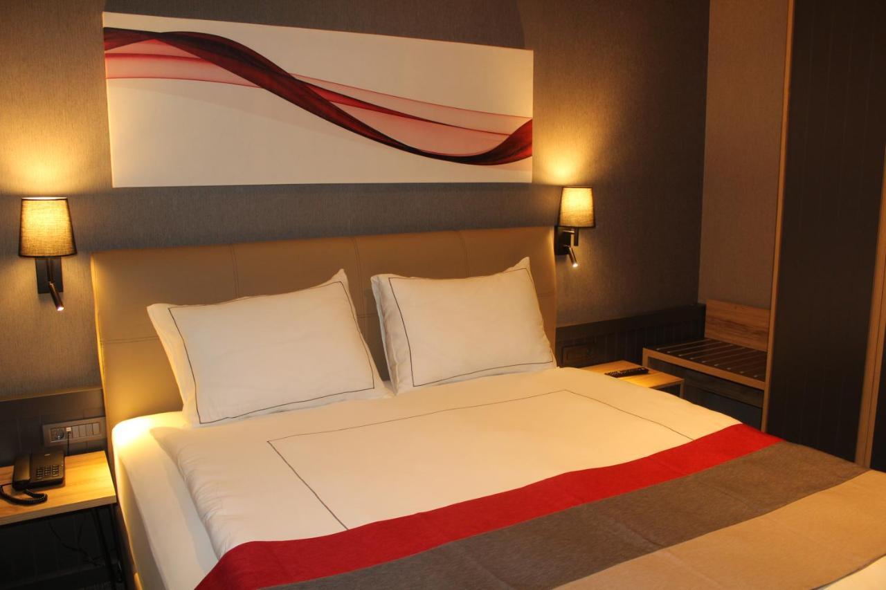 Hotel Ramada By Wyndham Tire Extérieur photo