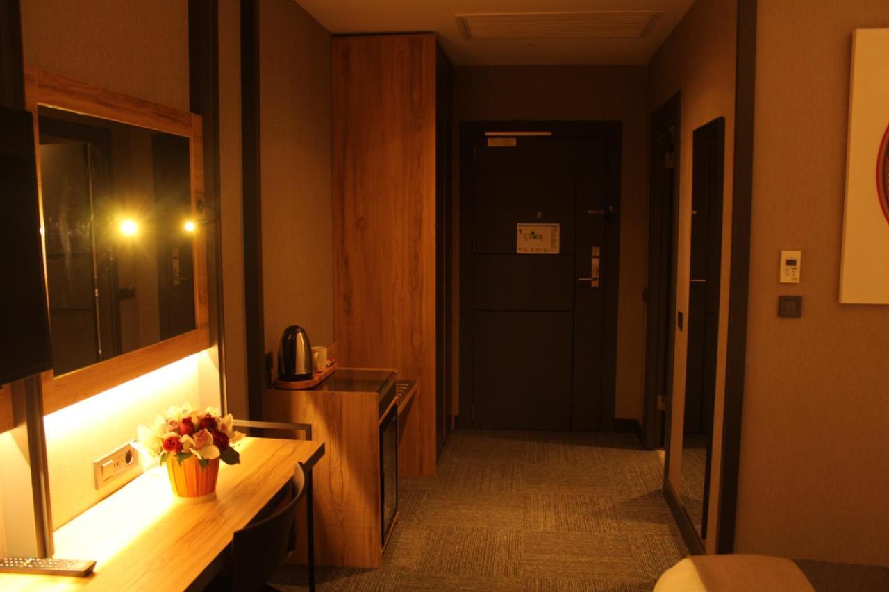 Hotel Ramada By Wyndham Tire Extérieur photo