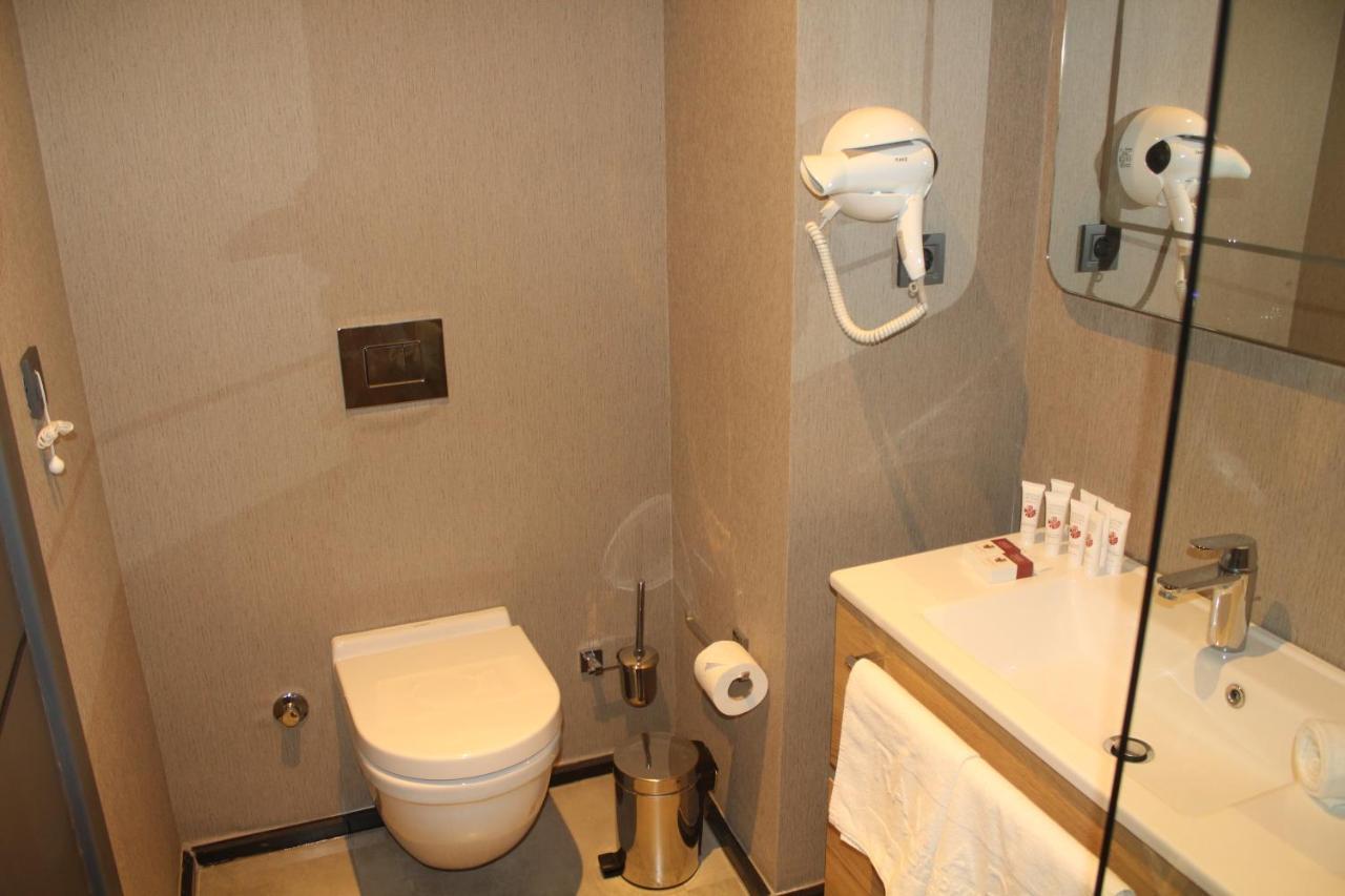 Hotel Ramada By Wyndham Tire Extérieur photo