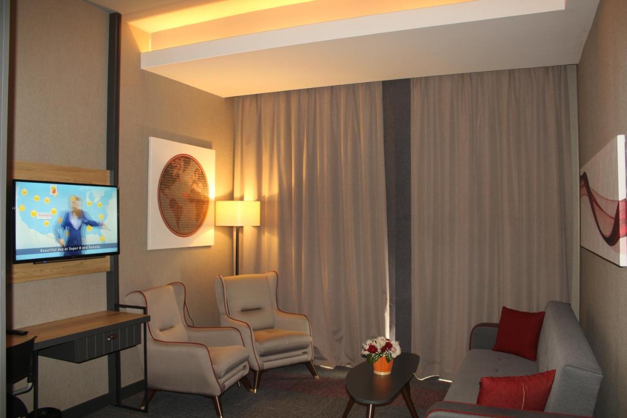 Hotel Ramada By Wyndham Tire Extérieur photo